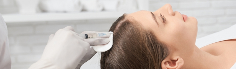 Clinic hair growth service treatment showing scalp stimulation and hair regrowth process